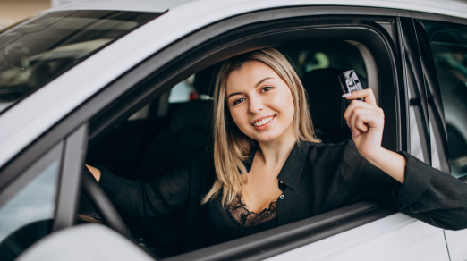 young-woman-testing-car-showroom